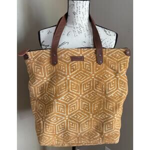 Large Tikka! zippered canvas tote bag with a geometric pattern leather handles